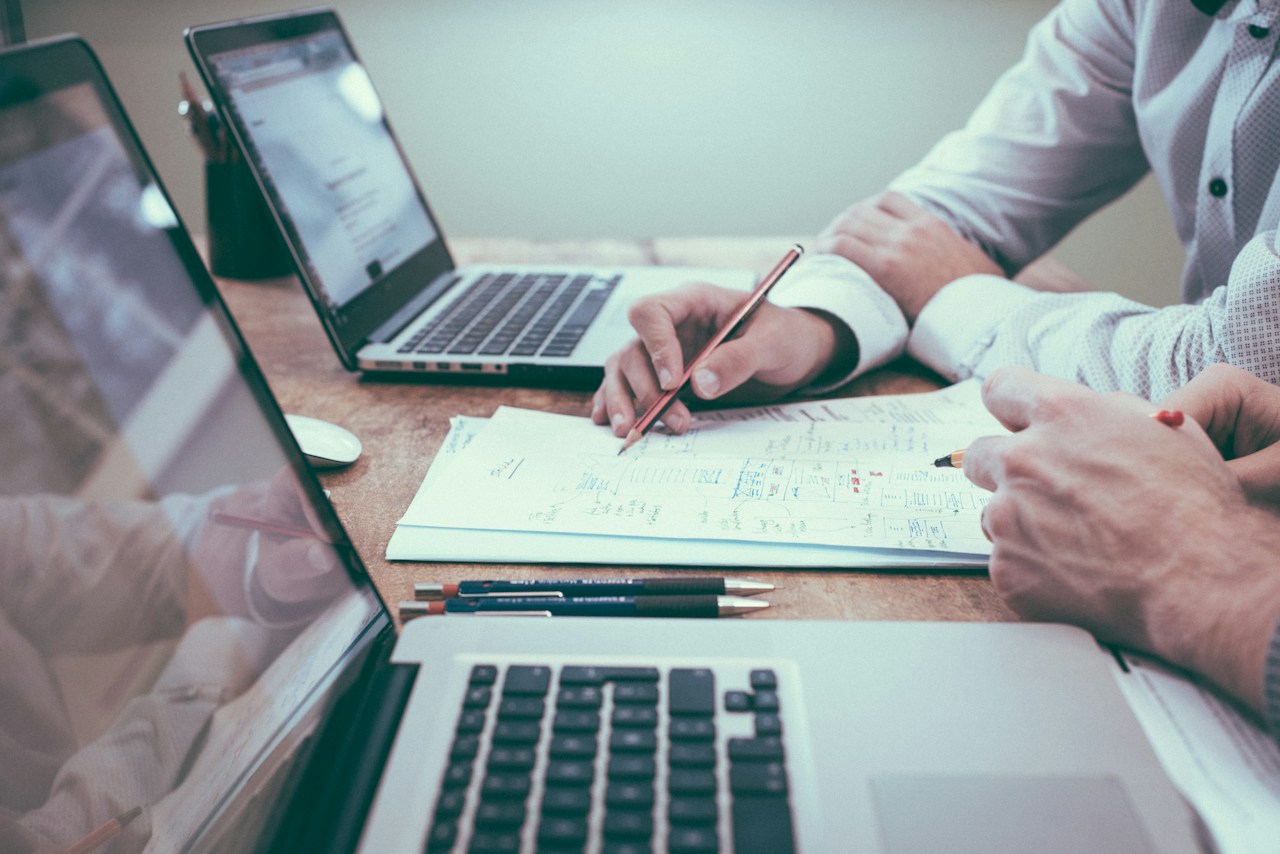 Advisor reviewing charts and notes during a financial planning session